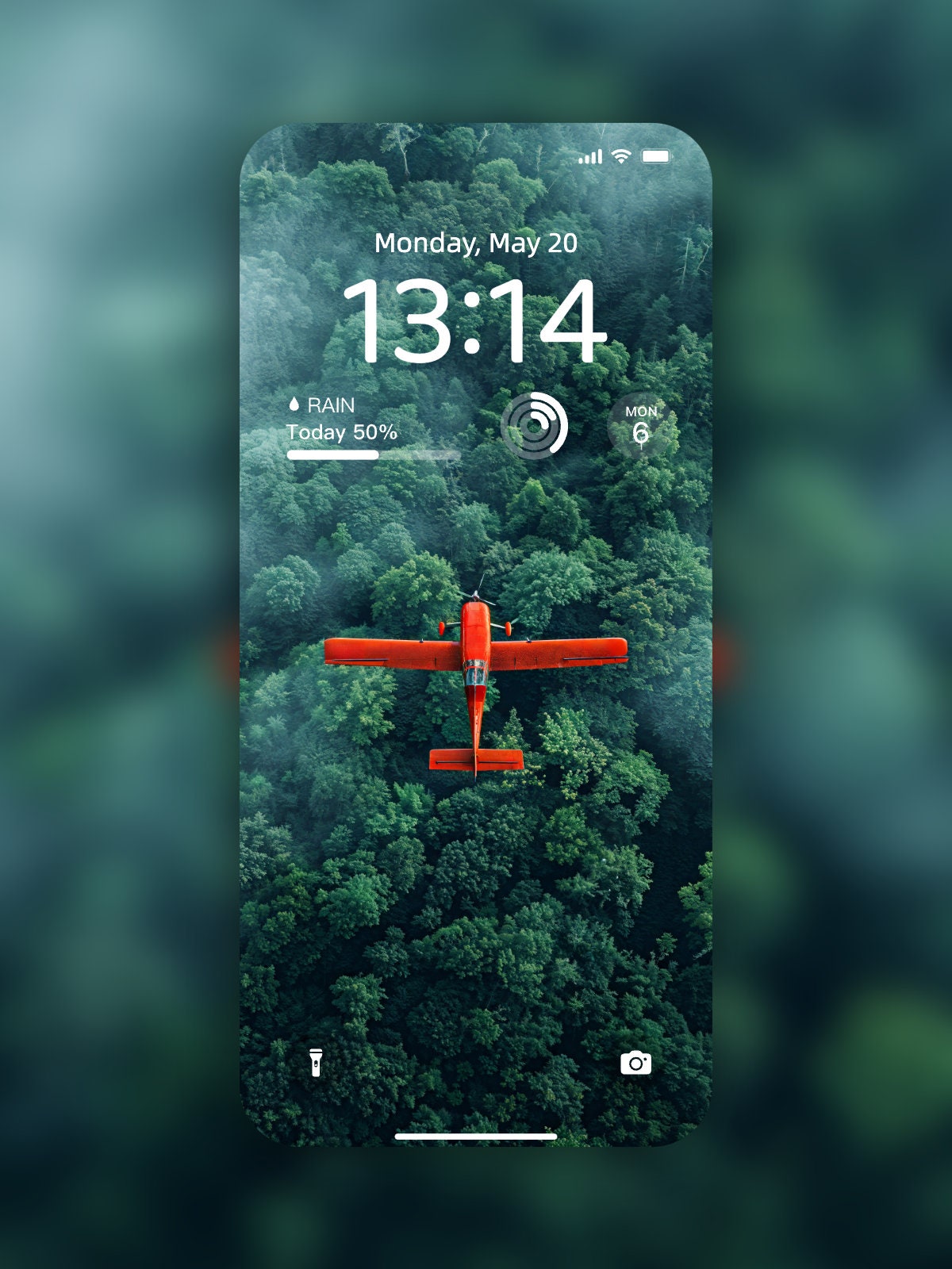 Aerial Adventure Plane Mobile Wallpaper | Vibrant Red Over Green Forest | HD Phone Wallpaper for iPhone & Android